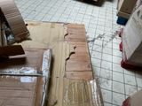 a room that has a lot of boxes and boxes on the floor