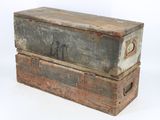 two old wooden boxes stacked on top of each other