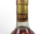 a bottle of wine that is sitting on a table