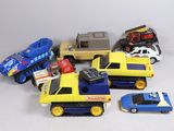 a lot of toy cars that are sitting on a table