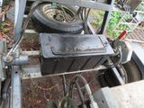a black box sitting on the back of a trailer