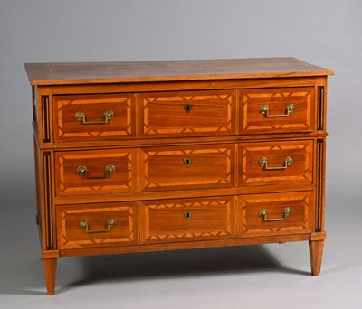 a wooden chest of drawers with many drawers on it