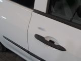 a white car with a black door handle and a black door handle