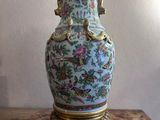 a vase that is sitting on a marble table
