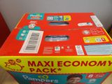 a box of diapers that is on a table