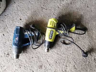 a corded drill and a corded drill on the floor