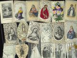 a lot of religious cards with pictures of the virgins