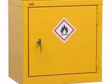 an image of a yellow metal cabinet with a fire extinguisor sign on it