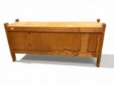 an image of a wooden bench with a drawer underneath it