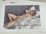 a drawing of a naked woman laying on a bed
