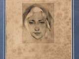 an old picture of a woman with a headscarf in a blue frame
