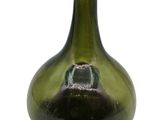 an image of a green glass bottle on a white background