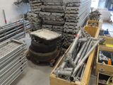 a lot of different types of pipes and pipes in a warehouse