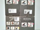 three boxes of brabantia hair dryer sitting on top of a table