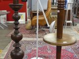 two lamps that are sitting on a rug in a room