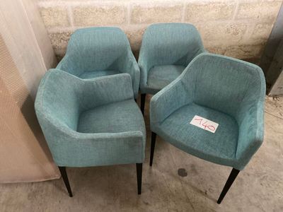 4 Chaises 200 en tissu turquoise.