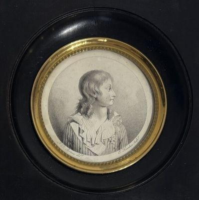 portrait of a woman in a striped dress in a black frame