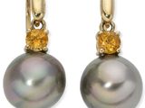 une photo d'une paire de boucles d'oreilles en perles et en citrine