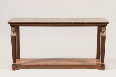 an antique wooden console table with marble top