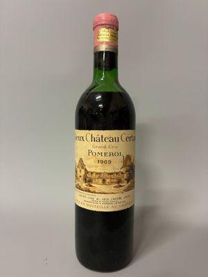 a bottle of wine that is sitting on a table