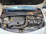 the engine of a car with its hood open and the hood down