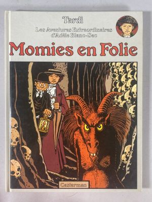 a picture of a book with a picture of a man and a demon