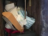 a cardboard box with a bunch of items inside of it
