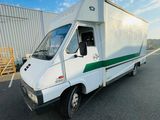 an image of a delivery truck parked in a parking lot