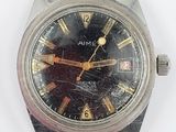 an image of a wrist watch on a white surface