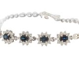 a bracelet with blue and white stones on a white background