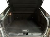 a trunk of a car with the back door open