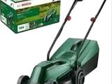 the lawn mower is being used to mow the grass