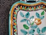 a picture of a decorative box with a flower design on it