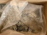 a box with a bunch of different types of screws in it