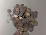 a pile of coins sitting on top of a table