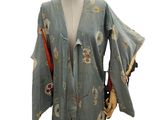 an image of a mannequin dressed in a kimono