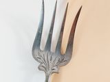 a fork that is sitting on top of a table