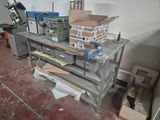a table with a bunch of boxes on top of it