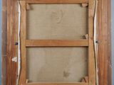 an old wooden frame with a picture hanging on the wall