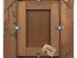 an old wooden picture frame with a tag attached to it