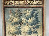 an image of a tapestry hanging on a wall in a room