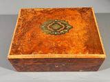 an image of a wooden box with a decorative design on the inside