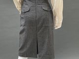 an image of a mannequin wearing a skirt and shirt