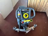 a machine that is sitting on the floor in the room