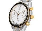 an image of a silver and gold watch with a white face