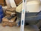 an image of a small boat in a garage