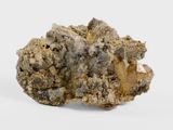 un gros plan d'un morceau de roche posé sur une surface blanche