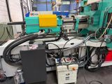 an image of a machine that is working on a piece of machinery