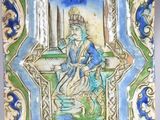 un gros plan sur un carrelage bleu et vert représentant une femme