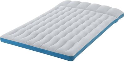 a close up of a mattress that is on a white surface